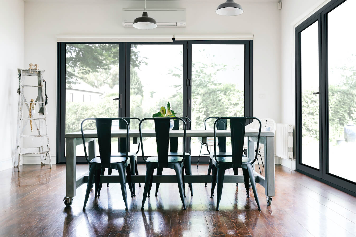 studioGlide bi-folding door internal three panel